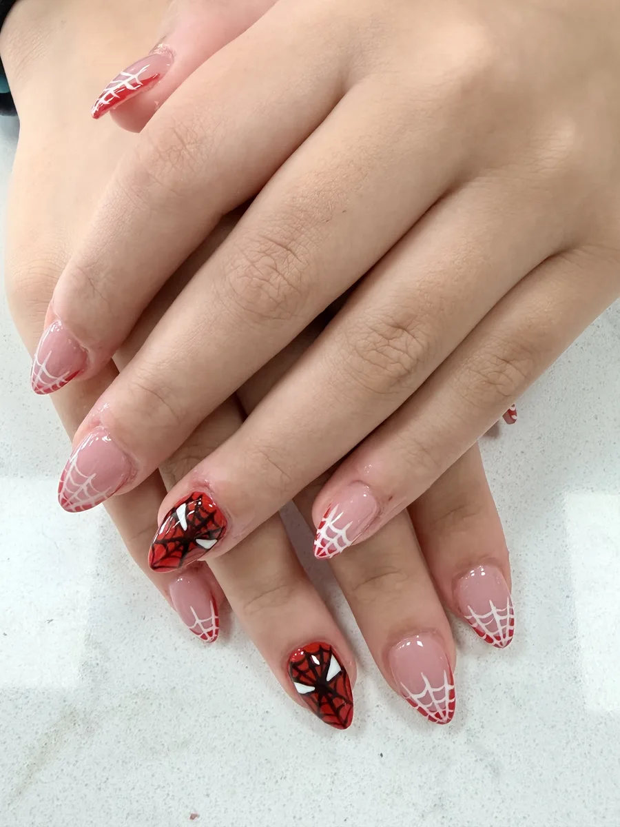 Soft pink spiderweb French nail art